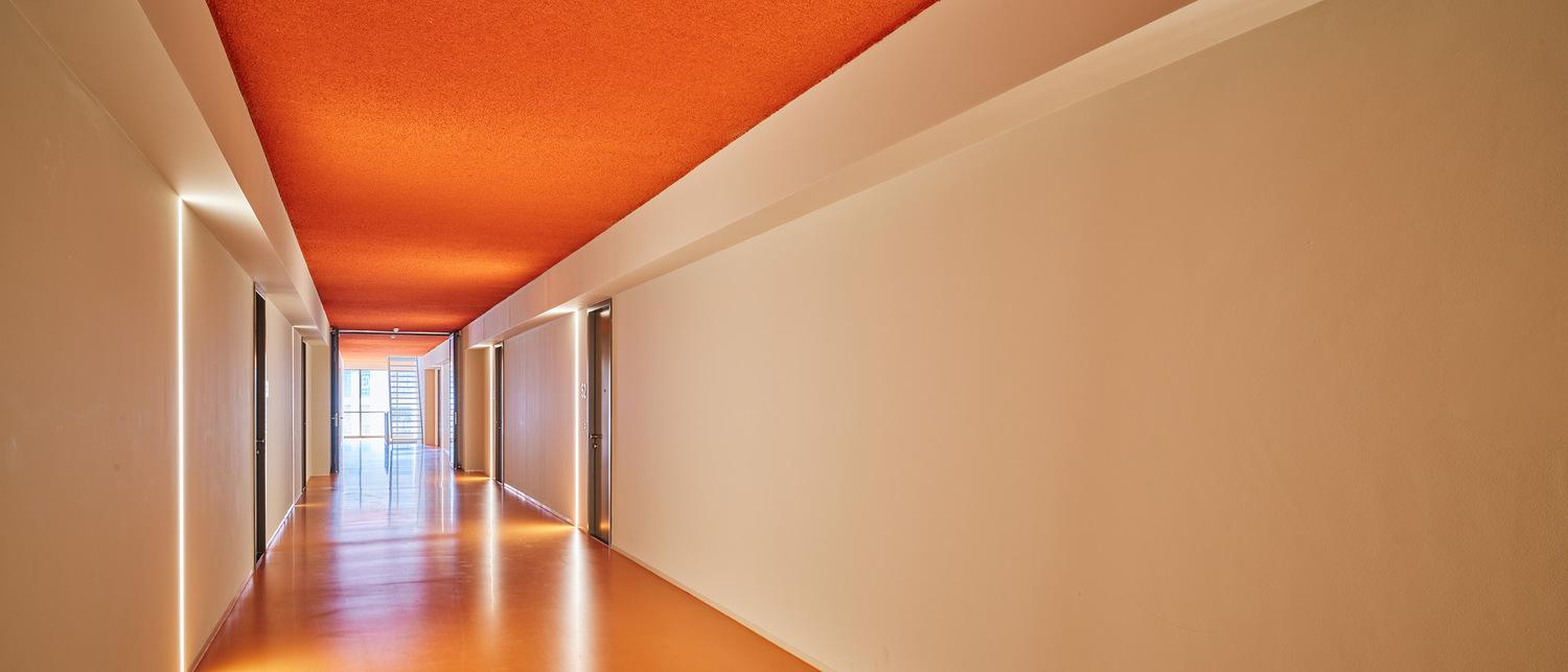 Hallway sprayed with an acoustic solution